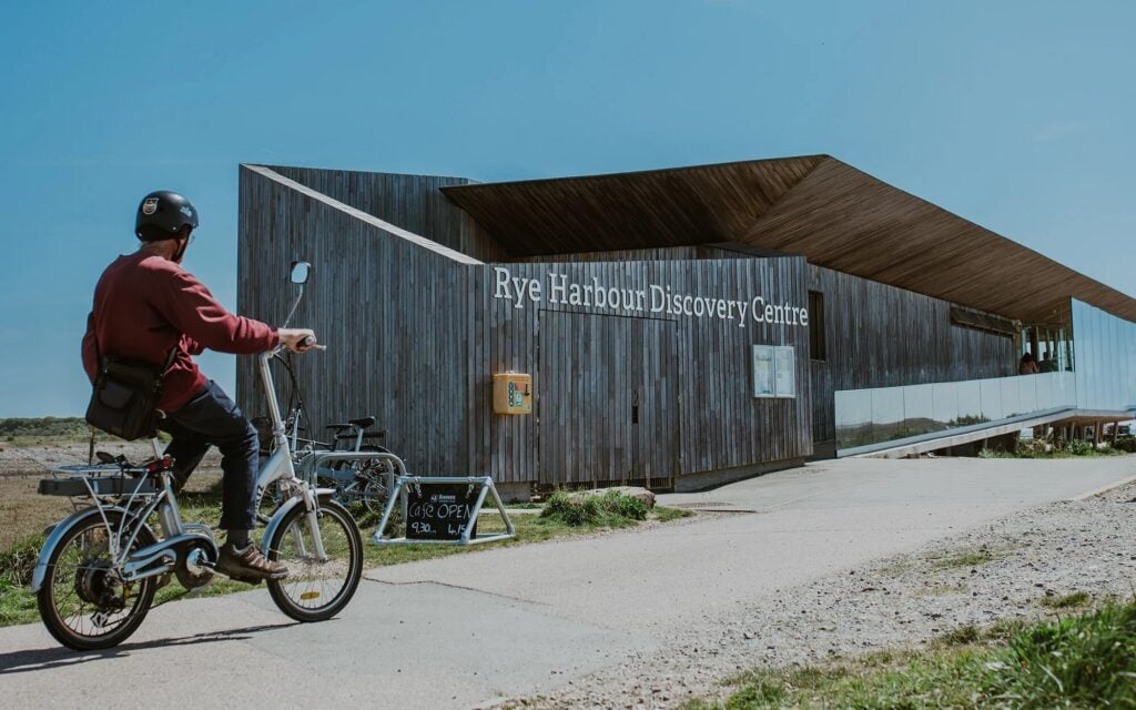 Rye Harbour Discovery Centre with cyclist