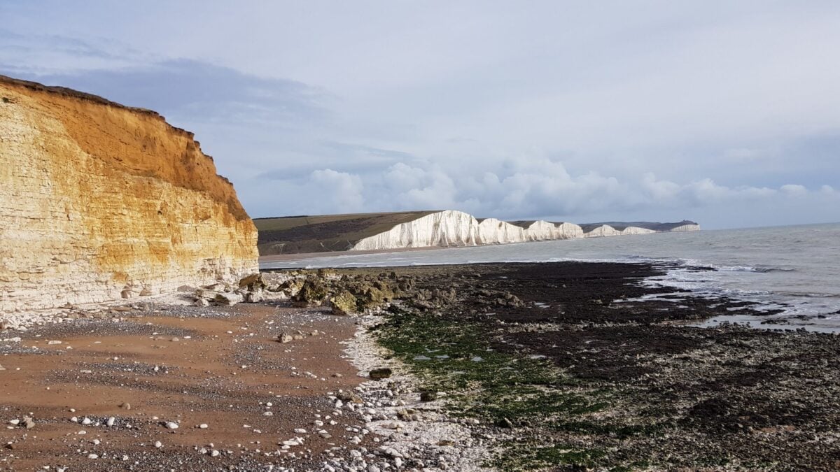 Seaford Head beach and view of Seven Sisters white chalk cliffs