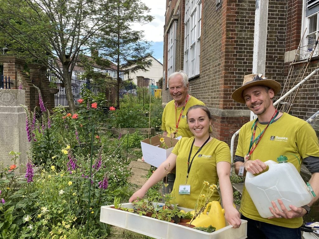 Mark N Cleo and vol at a Primary School for wildflower gardening